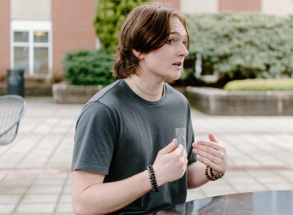 Freshman Milo Tisdale (he/they) discusses vegan and vegetarian food options around campus outside of the Valley Library on January 28, 2024.
