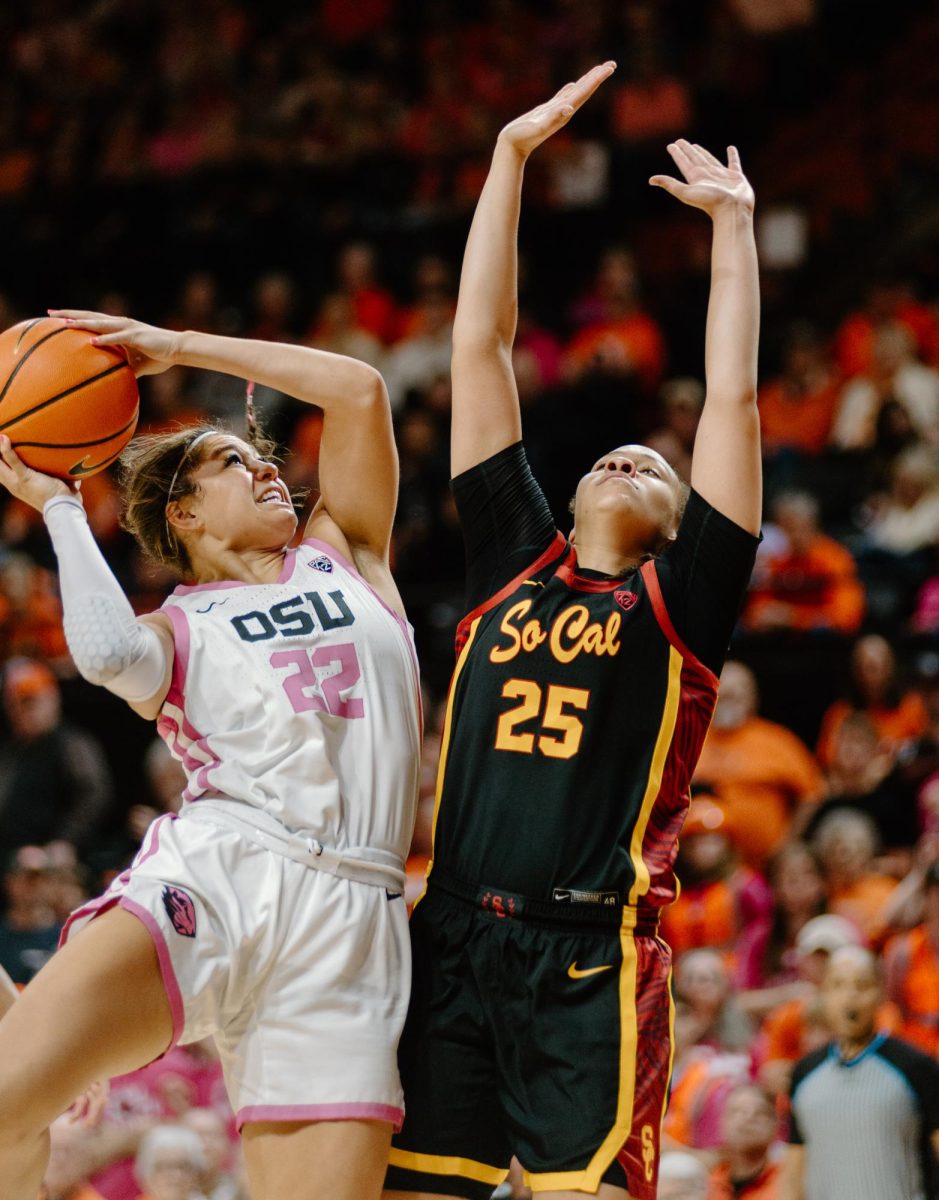 Guard Talia von Oelhoffen (#22) attempts to shoot in OSU’s game against University of Southern California in Gill Coliseum on Feb. 18, 2024.
