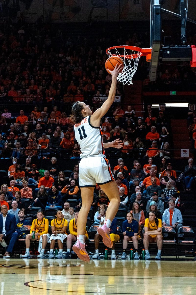 AJ Marotte (#11) of the OSU WBB team shoots a layup with ease against the Cal Bears in Gill Coliseum in Corvallis on March 2.