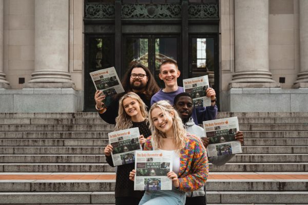 Barometer staff together holding up their Back to School print edition.