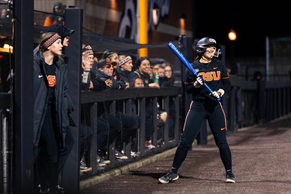 Alysa Del Val (5) practices her swings before she is up to bat at Kelly Field on March 9 in Corvallis, Oregon.
