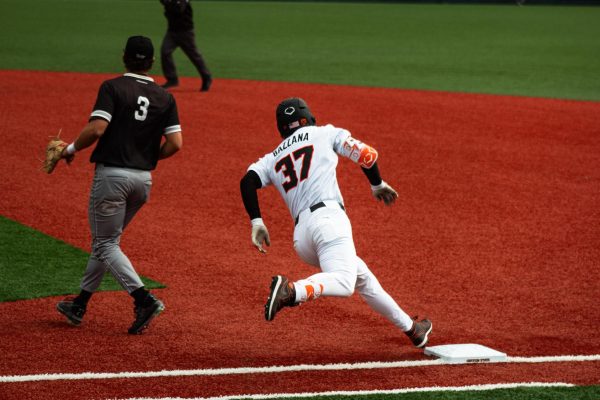 Second Baseman Travis Bazzana (#37) rounds first base after a hit to the outfield in OSU’s game against CSun on Mar. 9 at Goss Stadium in Corvallis.