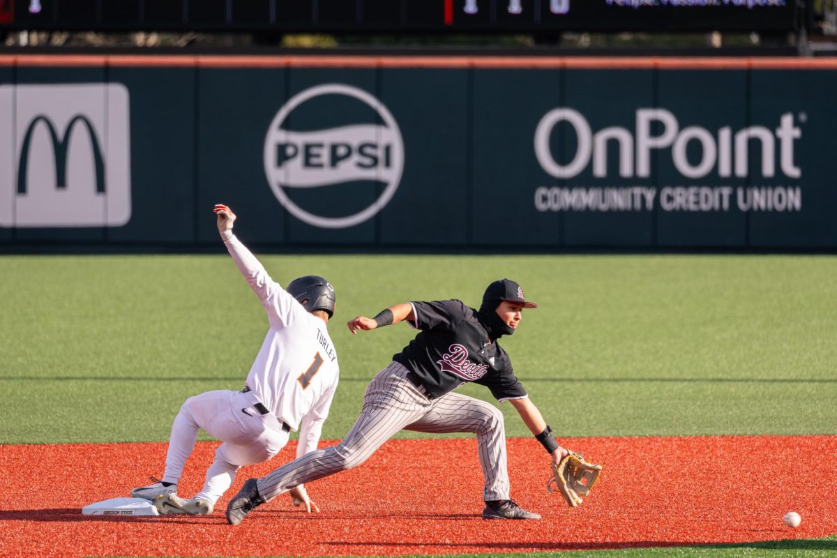 Gavin Turley (1) rushes to second base at Goss Stadium, Coleman Field in Corvallis Oregon on April 5.