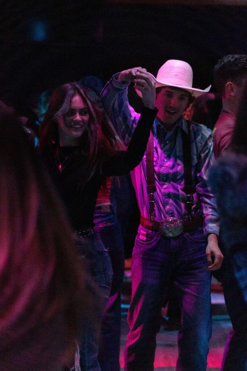 OSU Students and community members dance together at the Angry Beaver during their weekly line dancing night on Thursday, April 4 in Corvallis, OR. 
