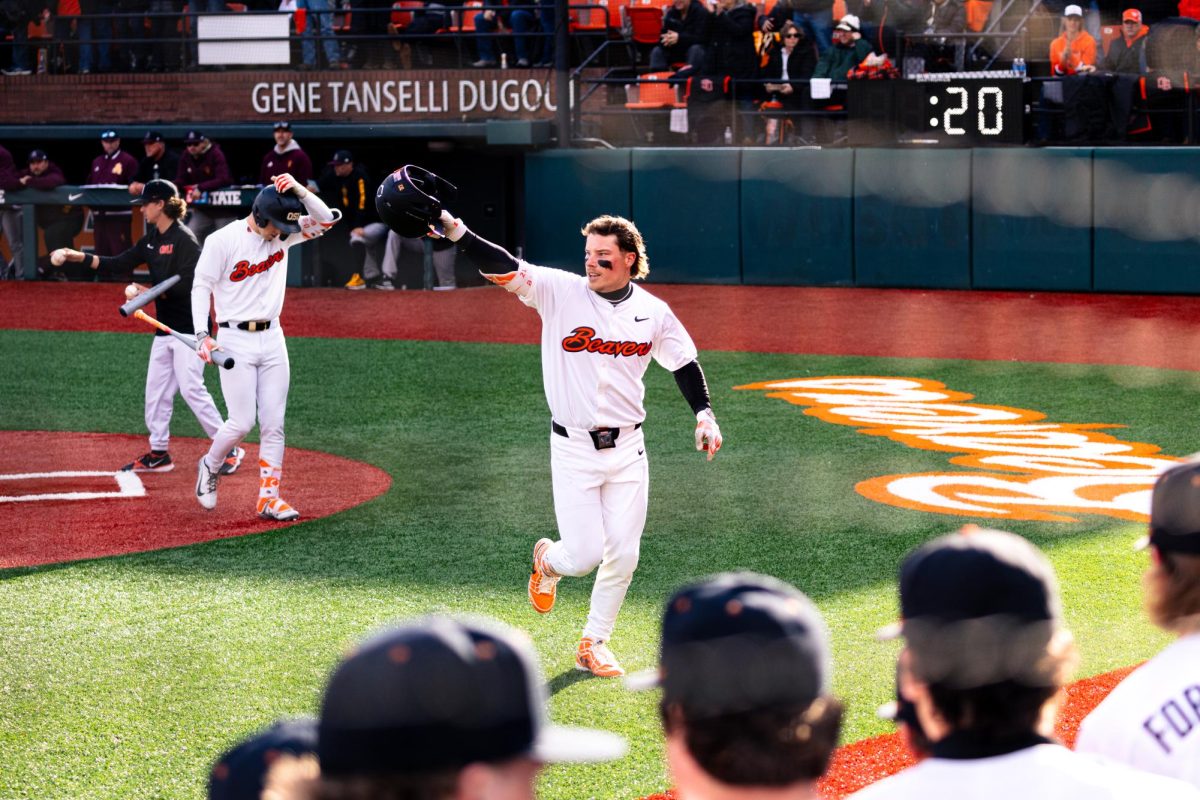 Travis Bazzana (37) celebrates as he makes his way to home plate winning the game at Goss Stadium, Coleman Field in Corvallis Oregon on April 5.