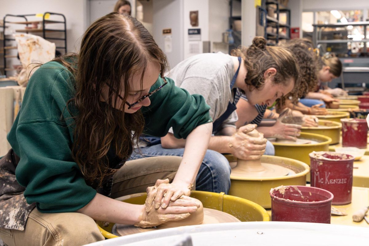 Third year mechanical engineering student Abby McCombs throws pottery in the Student Experience Center at Oregon State University, on April 12.