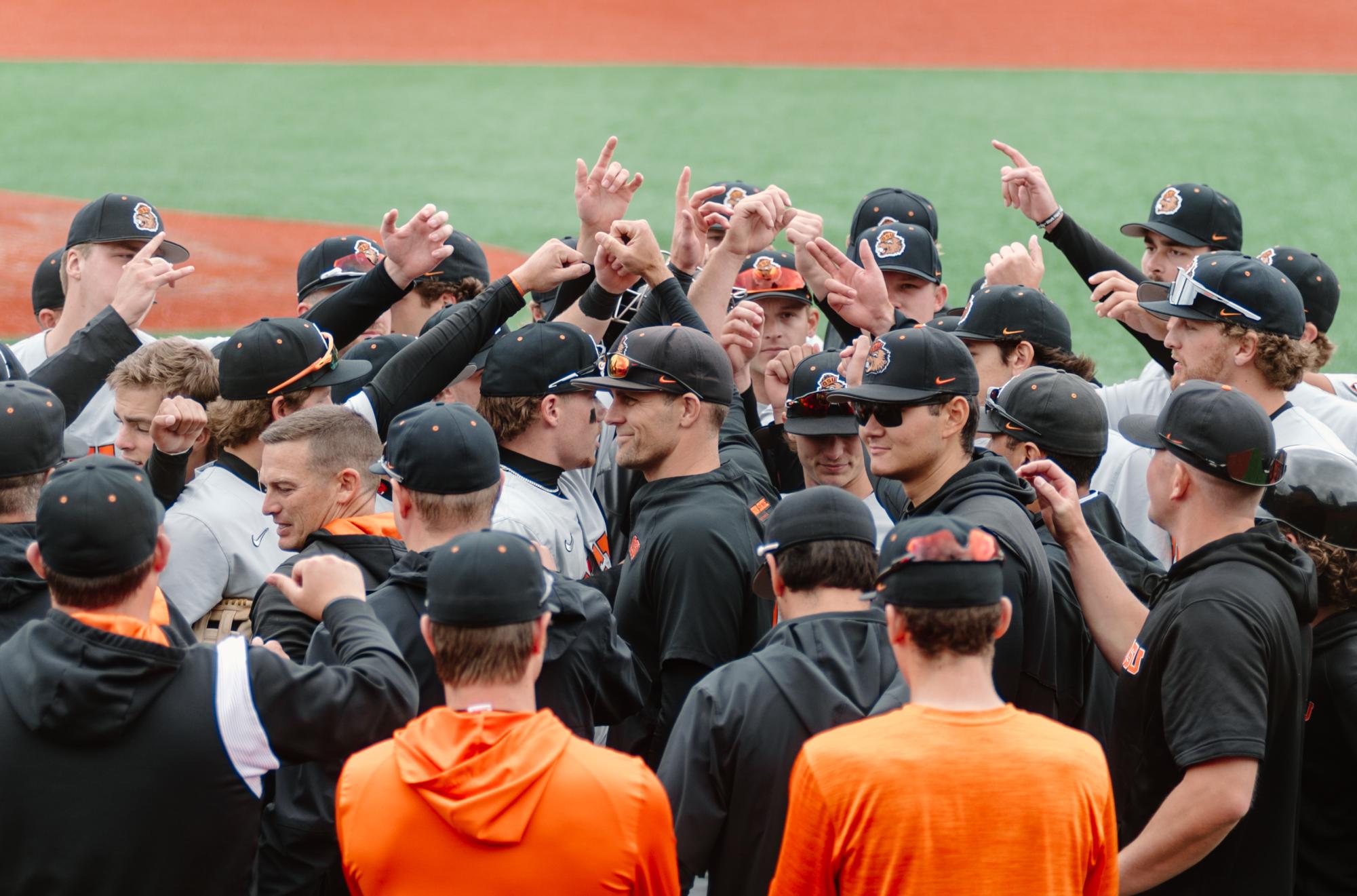 Travis Bazzana leads a group huddle in celebration of the Oregon State Beavers win against the UC Irvine Anteaters in the regional final at Goss Stadium in Corvallis on June 3, 2024. Oregon State defeated UC Irvine, 11-6, to advance to the programs ninth all-time NCAA Super Regional.