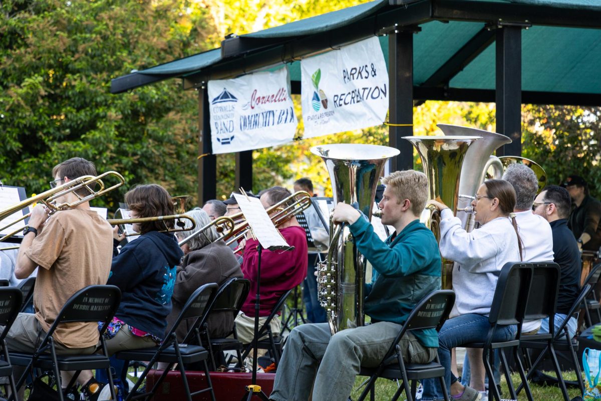 Members of the Corvallis Community Band perform at Central Park in Corvallis, Oregon on June 18. This performance “No Strings Attached” conducted by Justin Preece was the first of the Summer Concert Series that takes place every Tuesday at 7:30pm.