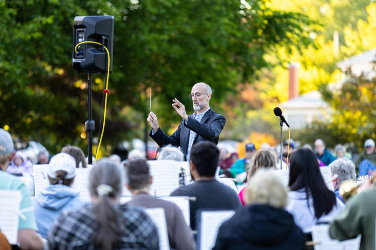 Justin Preece conducts “No Strings Attached”, the first of the Summer Concert Series at Central Park in Corvallis, Oregon on June 18.