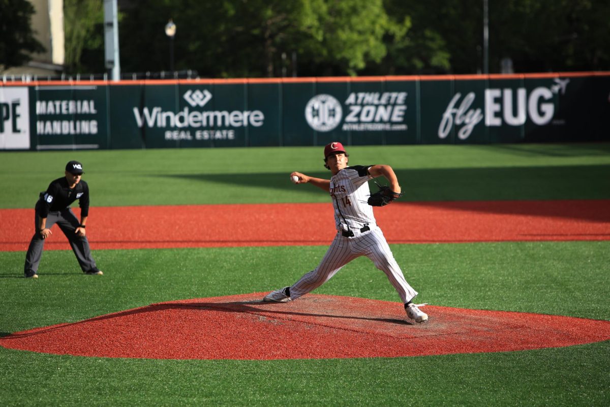 James DeCremer, Corvallis Knights #14, pitches the ballto the opposing Cowlitz Black Bears on June 27. 