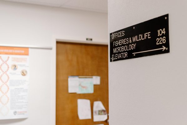 A sign depicting the fisheries and wildlife offices hangs on the wall of Nash Hall on June 5, 2024. Nash Hall developed a diagnostic laboratory for the Oregon Department of Fish and Wildlife (ODFW) Fish Health Services on the fifth floor.
