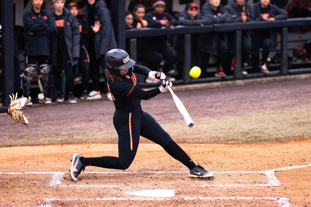 Lici Campbell hits the ball in a game against the Arizona Wildcats at Kelly Field in Corvallis on March 9.