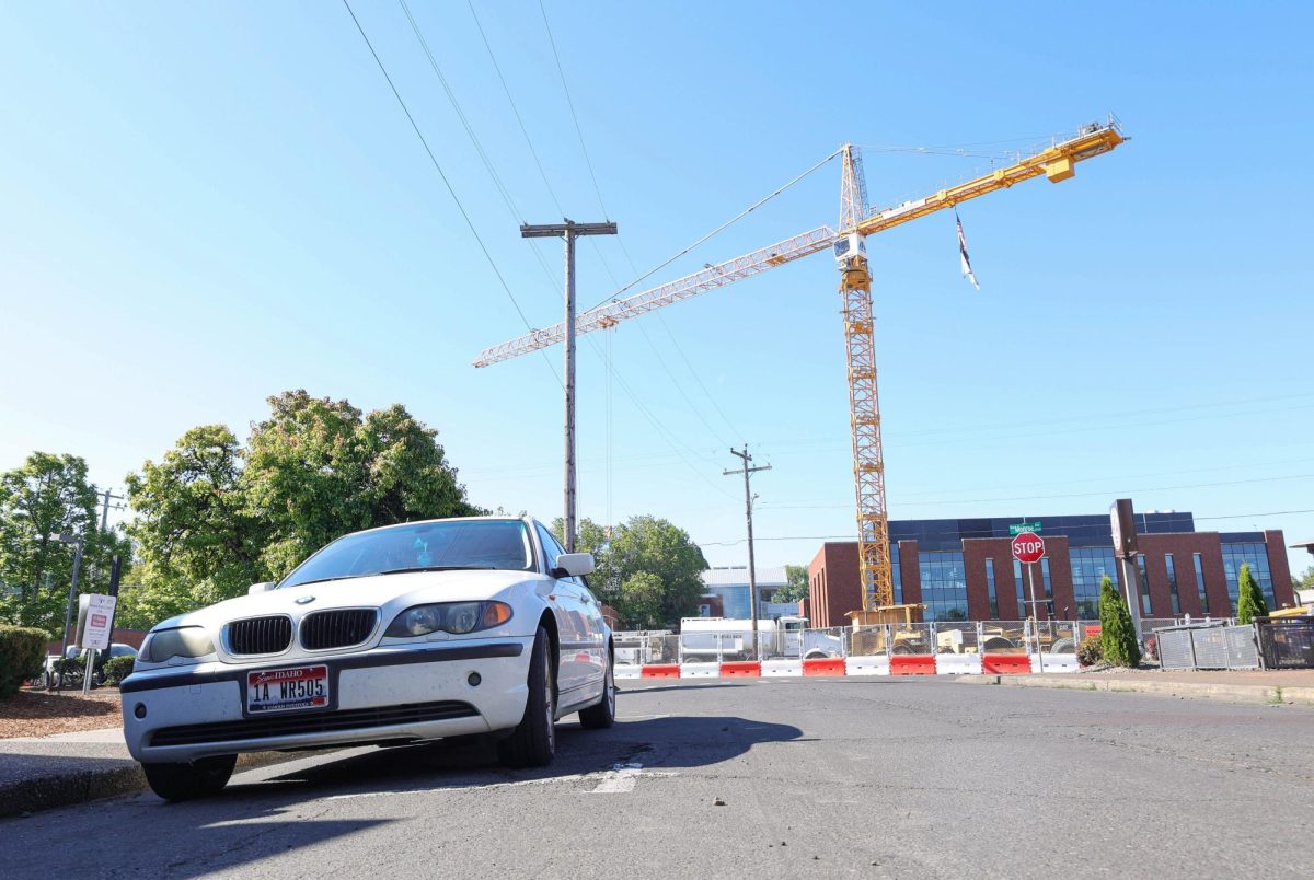 A crane operates amidst a construction site to assist in building the new computer science building on Oregon State University campus in Corvallis, OR, on June 19, 2024. 
