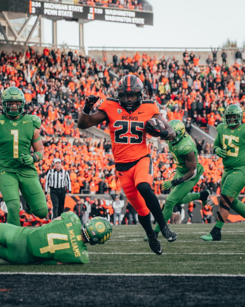 Isaiah Newell runs the ball for a touchdown against the University of Oregon Ducks at Reser Stadium in Corvallis on Nov. 26, 2022.