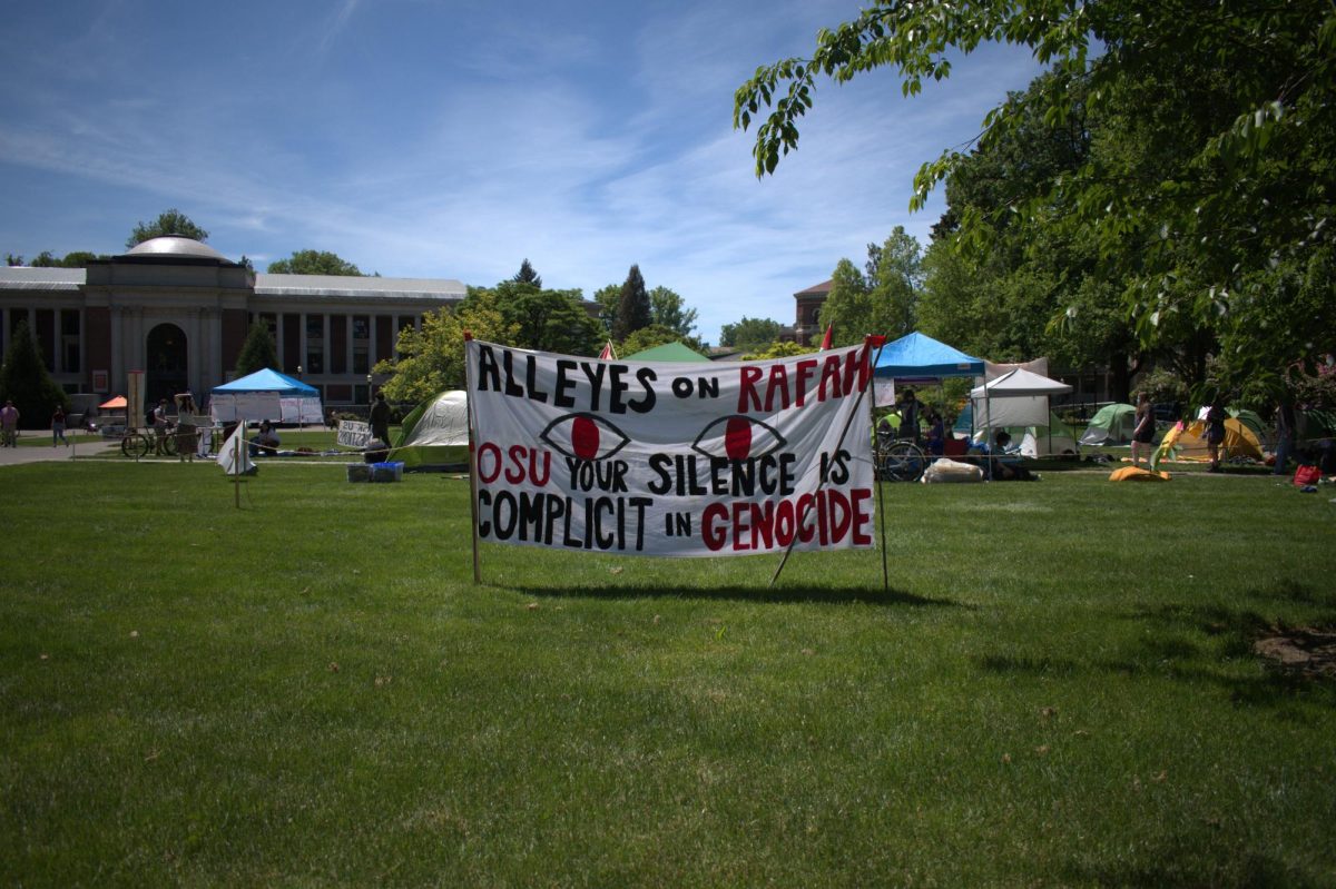 OSU Students engage in a peaceful encampment outside of the Memorial Union on May 15 in Corvallis. Their tents and signs displayed various messages to support their cause. 