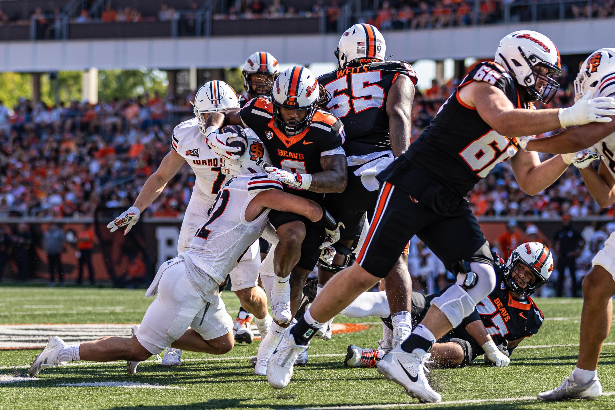 Anthony Hankerson (0) Charges through the defensive line to make a first down on August 31st, the Beavers took on the Idaho State Bengals at Reser Stadium, the beavers fought hard, taking the first season win (38-15)
