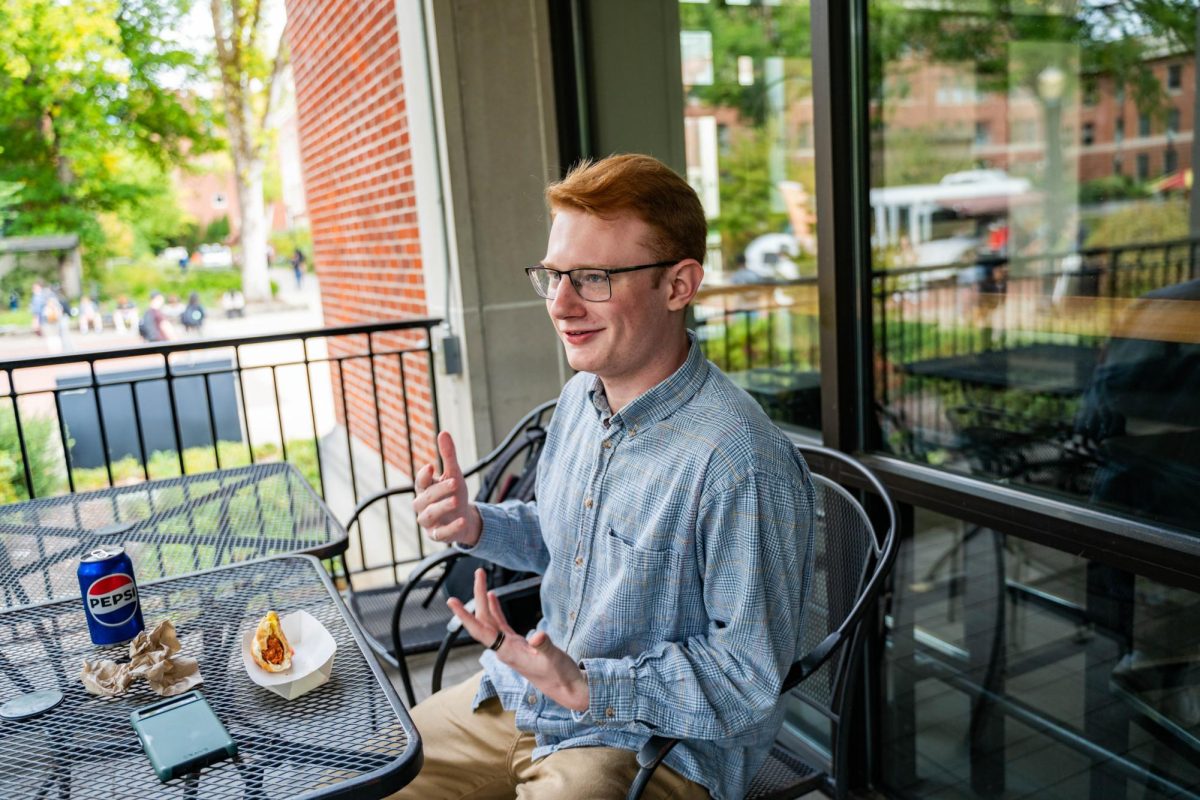 Duncan Brown (he/him), a sophomore studying Bioengineering sits outside the Memorial Union and talks about his plans for Halloween costumes on Oct 8, 2024.