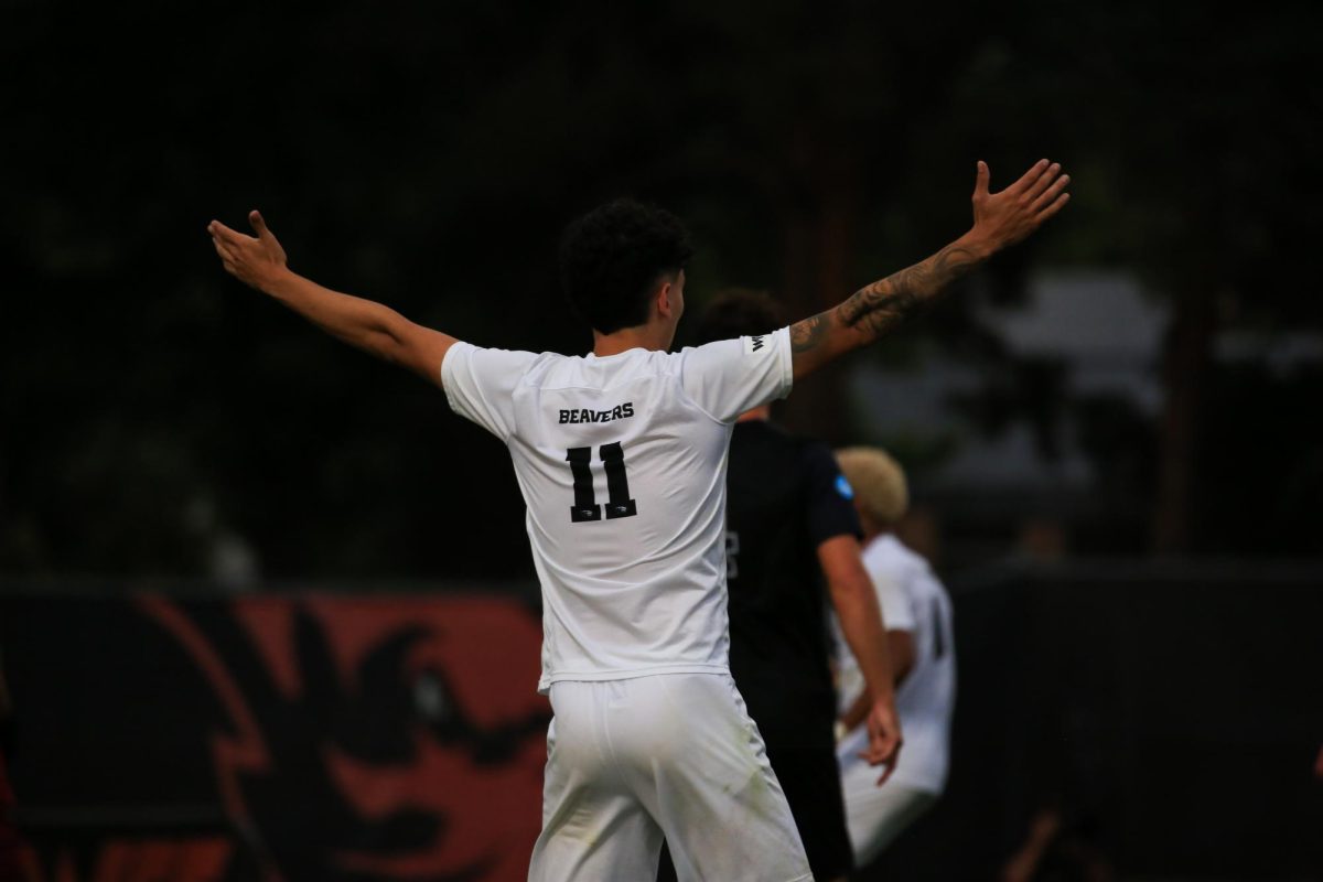 OSU Men’s soccer player, Arnau Farnos, throws his hands up during a game against UC Irvine on August 22.