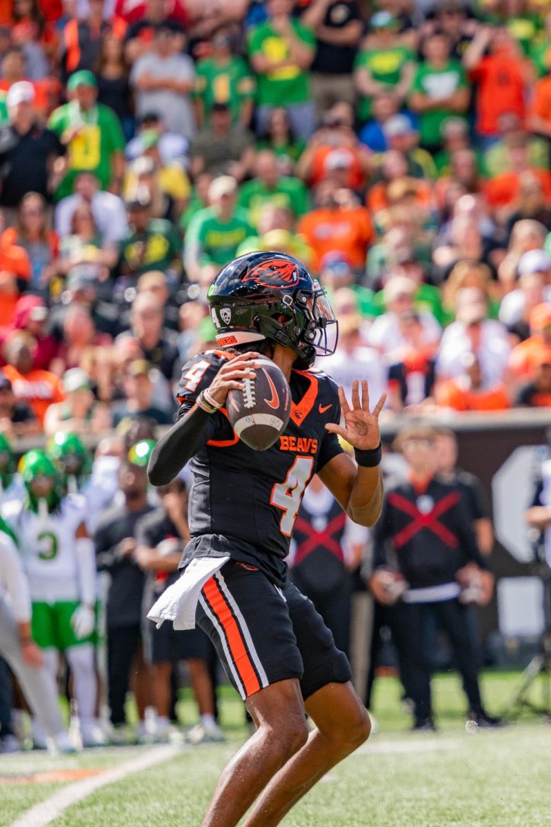 Quarterback Gevani McCoy (#4) prepares to throw the ball during the home game against the Oregon Ducks on September 14, 2024 at Reser Stadium. 