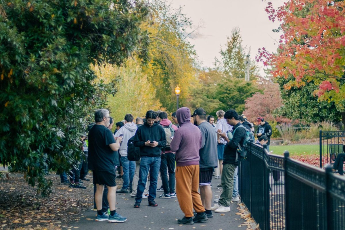 Residents of Corvallis play Pokémon at Central Park at 6pm on Wednesday for “Raid Hour” on Pokémon Go in Corvallis on Oct. 16th.