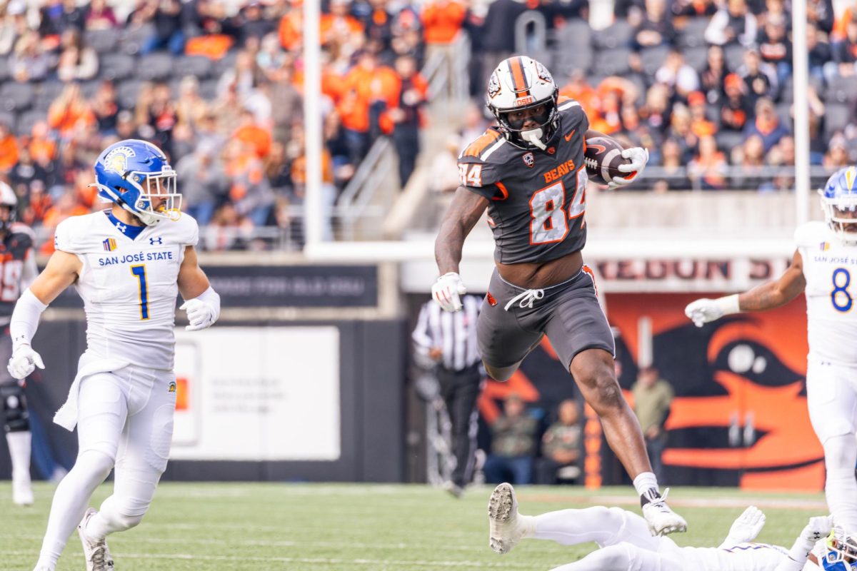 Tight end Jermaine Terry II (84) jumps over San Jose State University’s defense at Reser Stadium on Nov 9, 2024.