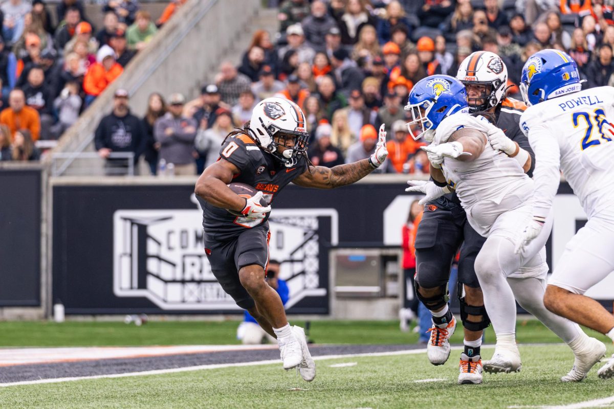 Running Back Anthony Hankerson (0) dodges San Jose State University’s defense at Reser Stadium on Nov 9, 2024.