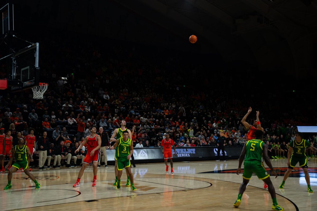 Oregon State’s Michael Rataj (12) shoots as the Beavers take on University of Oregon Ducks in a college basketball game on Thursday, Nov. 21, 2024, at Gill Coliseum in Corvallis.