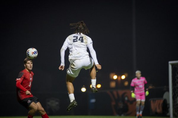 Defender Enzo Newman fields a pass in the second half against Gardner-Webb at Paul Lorenz Field on Nov 21. Newman’s aggressive play was key to the Beavers’ attack in the second half, but was not enough to overcome the Bulldogs’ defense.