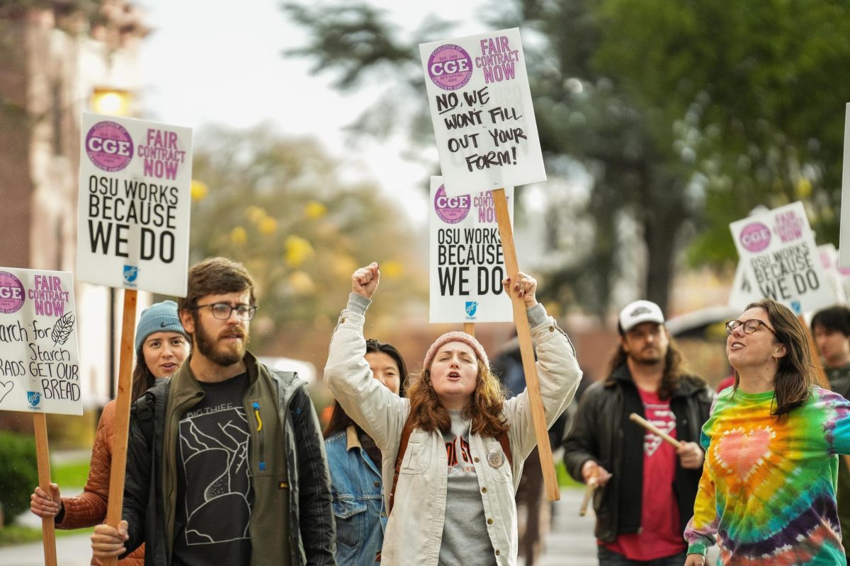 CGE strikers chant in front of the Memorial Union on Nov. 22.