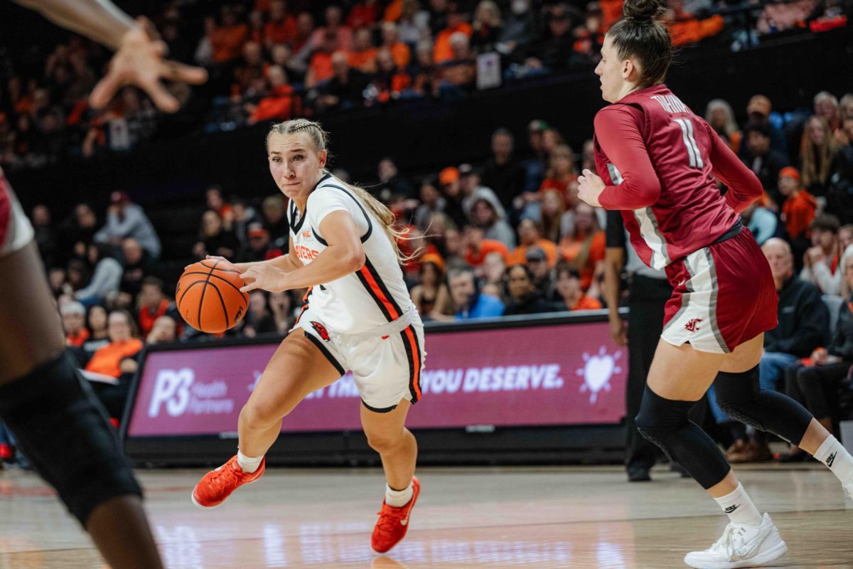 On Jan 27, 2025, sophomore Kenndie Shuler (#1) rushes the ball in a close game against Washington State in Gill Coliseum.