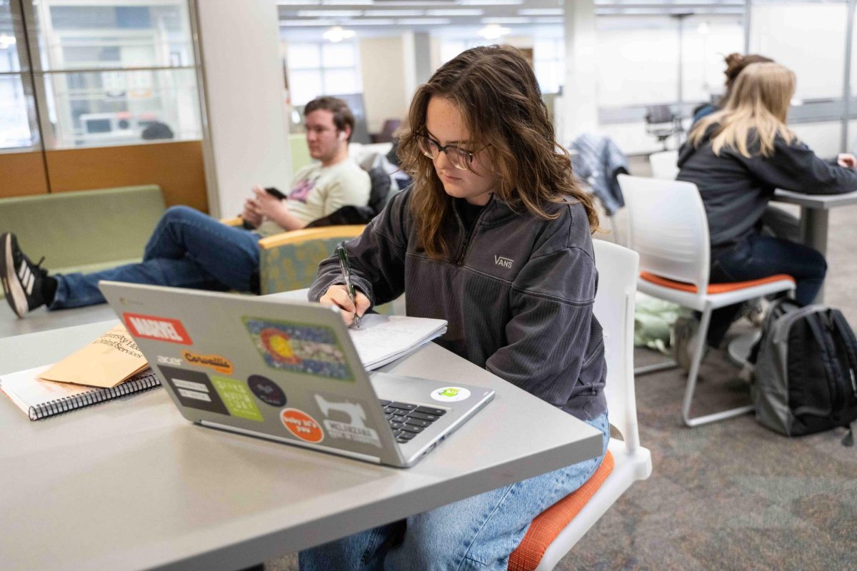 Audrey McFadden studies on the first floor of the library.