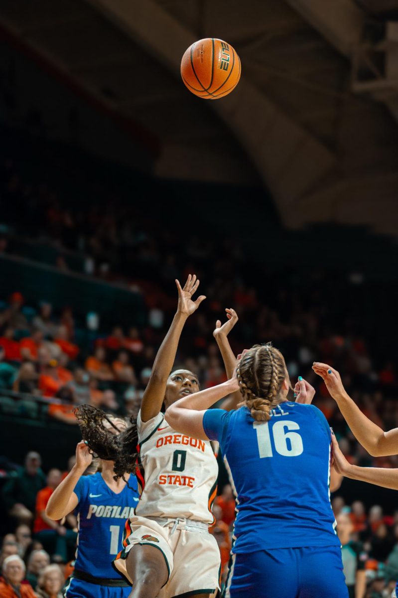 Tiara Bolden (0) leaps into the air for a two-pointer against University of Portland on Jan 18th, 2025.