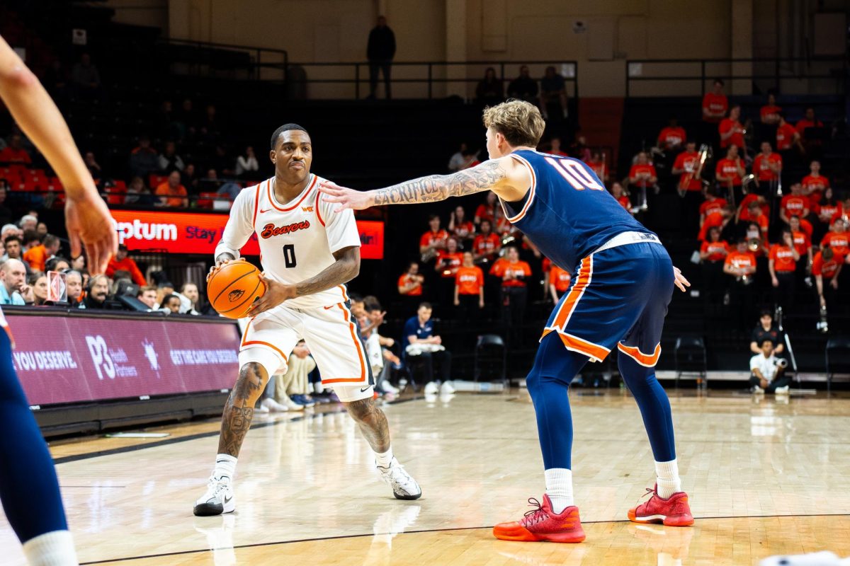 Oregon State’s Demarco Minor (0) looks to pass as the Beavers take on the Pepperdine Waves in a college basketball game on Thursday, Jan. 23, 2025, at Gill Coliseum in Corvallis.