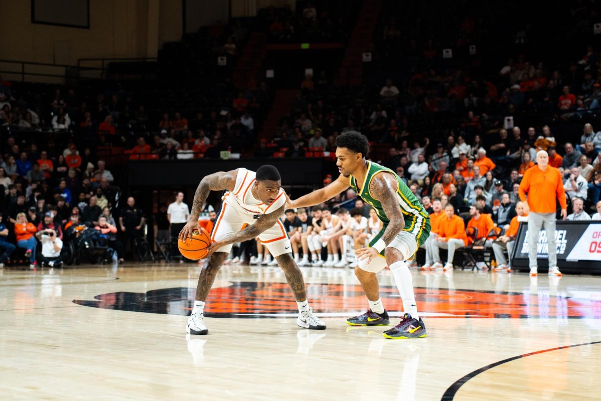 Oregon State’s Demarco Minor (0) looks to pass as the Beavers take on the San Francisco Dons in a college basketball game on Wednesday, Feb. 26, 2025, at Gill Coliseum in Corvallis.