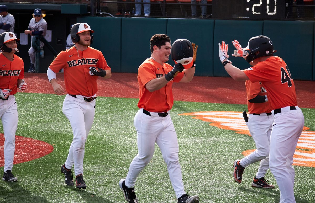 Junior OF Dallas Macias (center) celebrates his home run in the 8th inning during game 3 against San Diego in Goss Stadium on March 9, 2025. Macias’ home run was the only one in the game from either team, and was a 3-run swing that helped the Beavers finish the series strong.