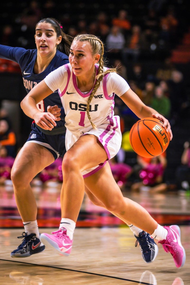 Point Guard Kennedie Shuler (1) running past her defender against Gonzaga at Gill Coliseum on Feb 13.