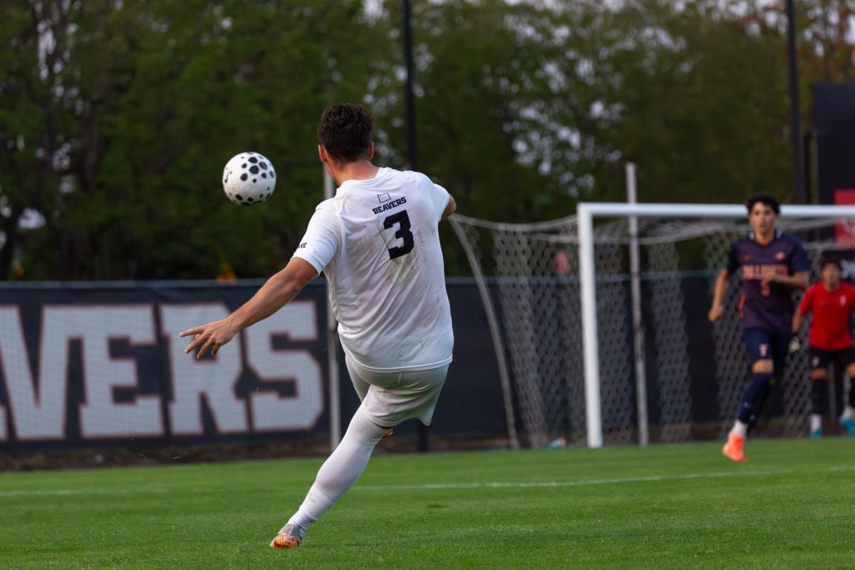 OSU Defender Fran Cortijo (3) sends a cross into the box. Oregon State beat Fullerton 4-2 at Lorenz Field in Corvallis on Sep 4, 2025.