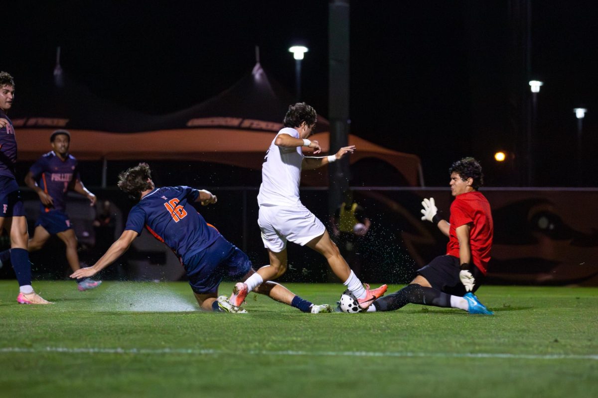 OSU Defender Iker Carbonell Garcia beats a defender and takes on the keeper to go for the goal. Oregon State beat Fullerton 4-2 at Lorenz Field in Corvallis on Sep 4, 2025.