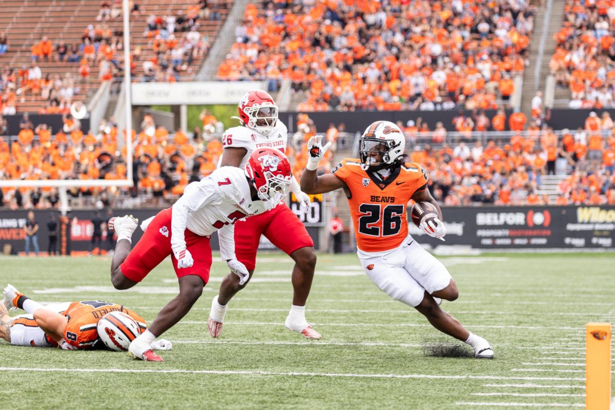 Running back Salahadin Allah catches the ball at the game against Fresno State University on Sept. 6, at Reser Stadium. In the second home game of the 2025 season, the Beavers lost to the Bulldogs 36-27.