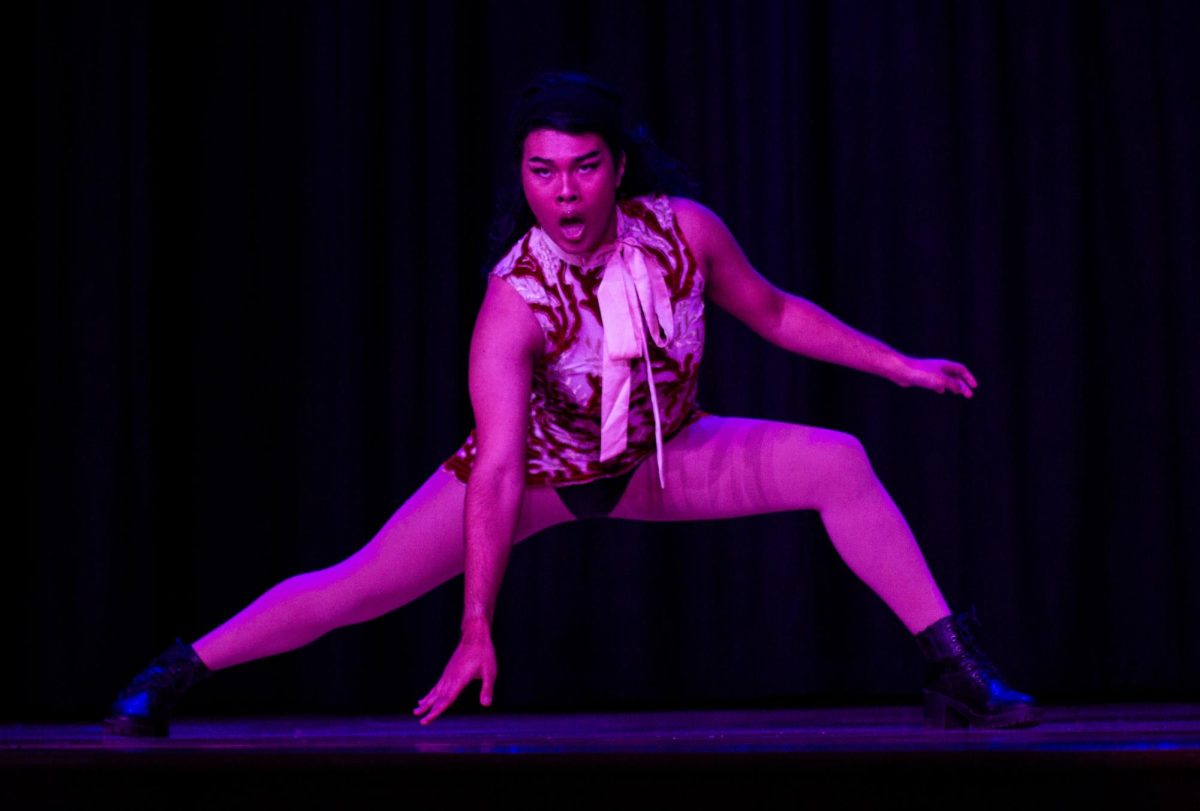 Drag queen Augustine L. Élégance does her second performance at the Rainbow Continuum Fall Drag Show "A Night at the Ball" in the Memorial Union Ballroom on Oct. 25.