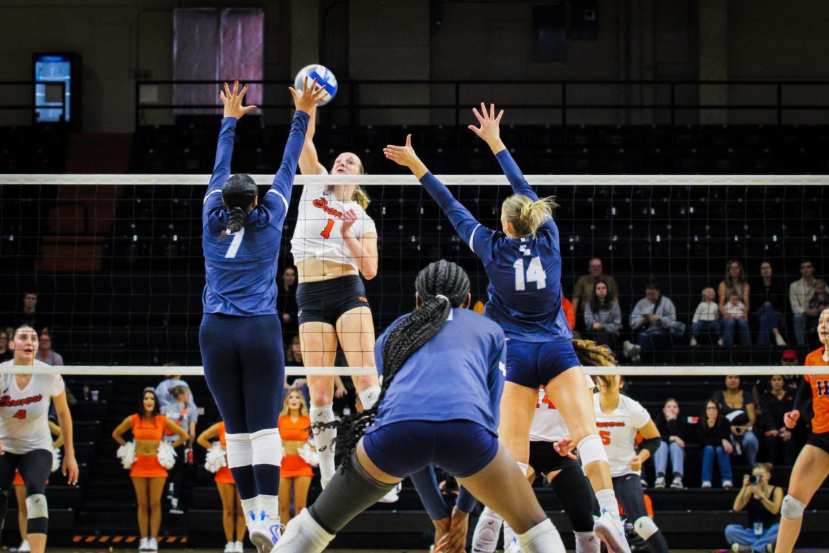 Middle Blocker Alana Marrs (1) attacks in Oregon State’s volleyball game against San Diego at Gill Coliseum in Corvallis on November 13, 2025.















