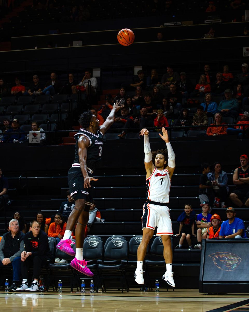 Keziah Ekissi (7) attempts the jumper to help fight the deficit the Beavers are in late. 