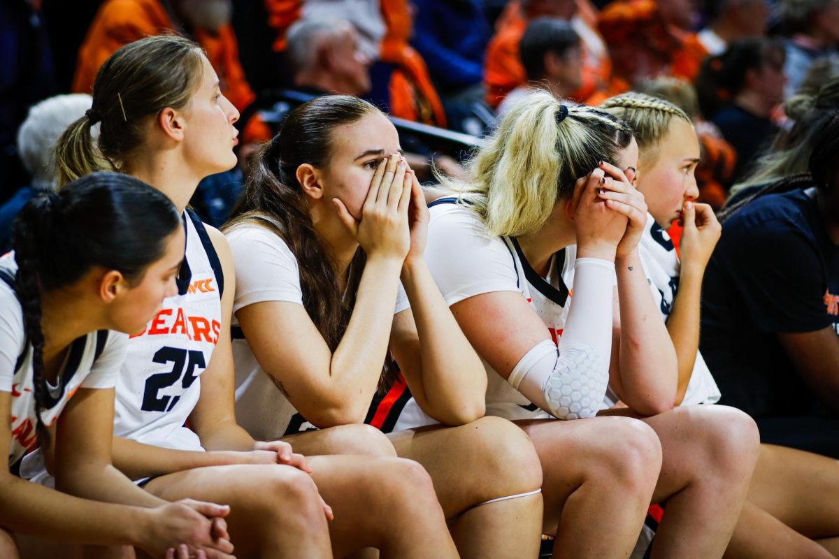 Forward Lara Alonso-Basurto (22) covers her face on the bench at Gill Coliseum in Oregon State’s game against Gonzaga on January 22, 2025. Gonzaga scored a three pointer in the final eight seconds tying the game and sending both teams into overtime.