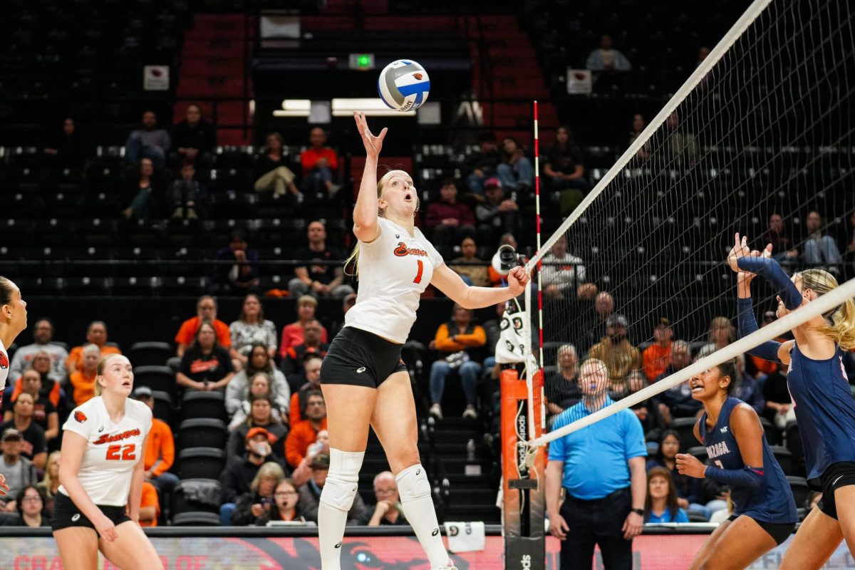 Middle blocker Alana Marrs (1) leaps in the air to send a power tip to Gonzaga in Gill Coliseum at
Oregon State University on Oct. 9, 2025.