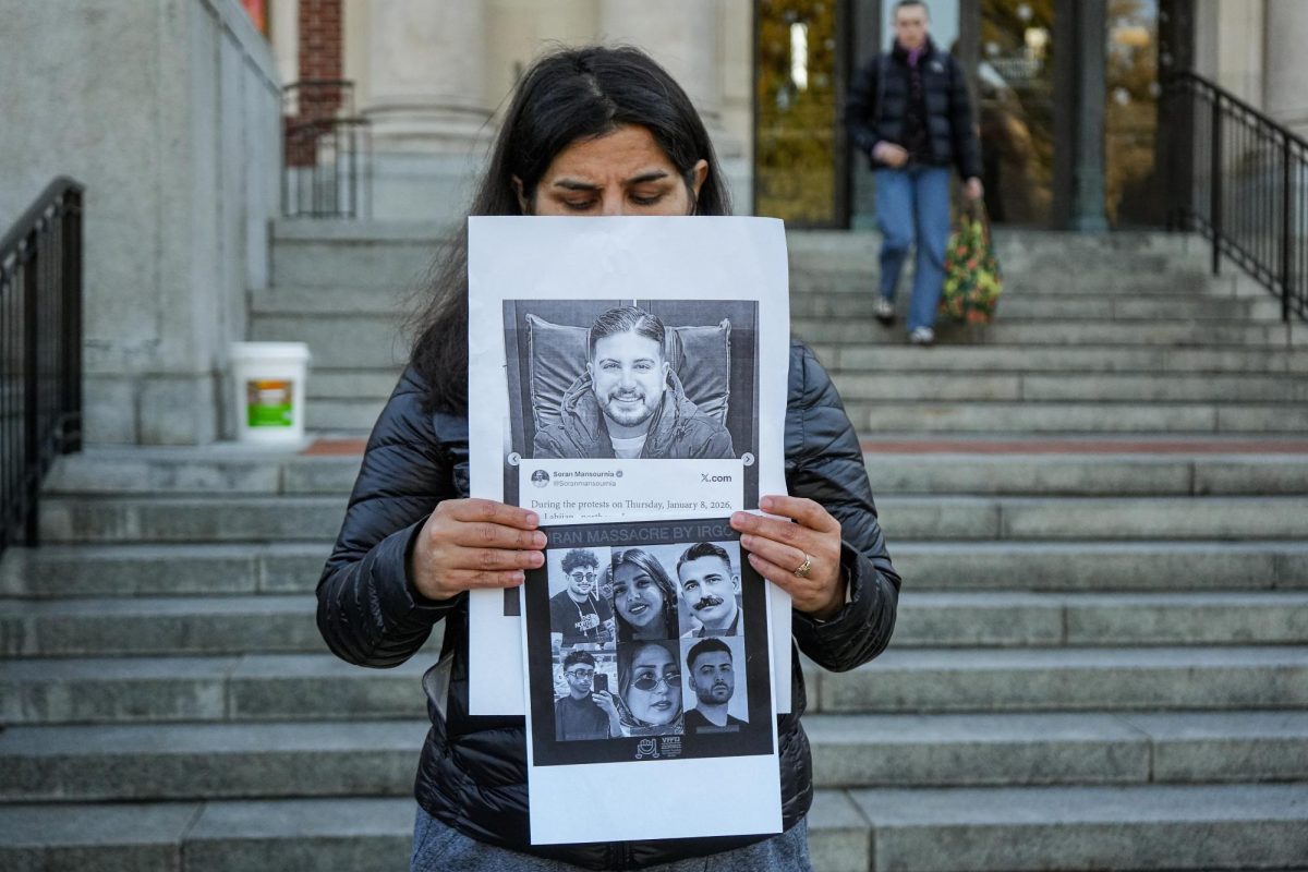 An OSU student holds signs that acknowledge the voices that have been taken in Iran on Jan 23rd, 2026. Students gather in remembrance of Iranian citizens in front of the Memorial Union.