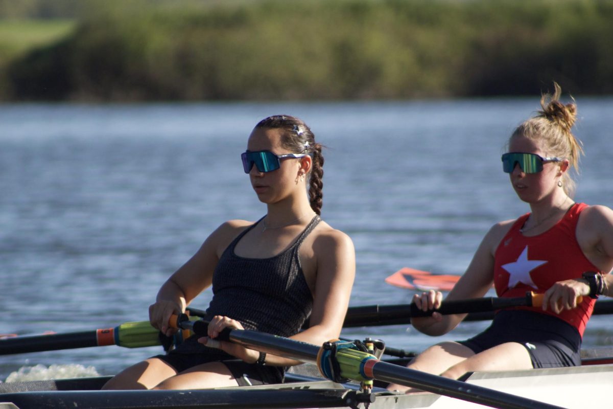 Senior Giulia Clerici and junior Charlotte Lightfoot row in stern pair of the 1V8 on April 14, 2025, at a power per stroke session on the “pond” in Corvallis, Oregon.