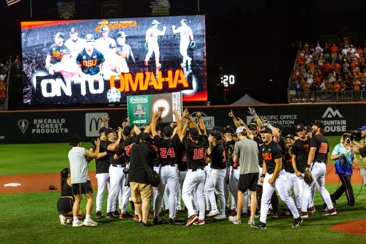 Oregon State Baseball holds up their ticket to Omaha after they beat the Seminoles 14-10 at Goss Stadium in Corvallis on June 8, 2025. Baseball season officially starts Feb. 13.