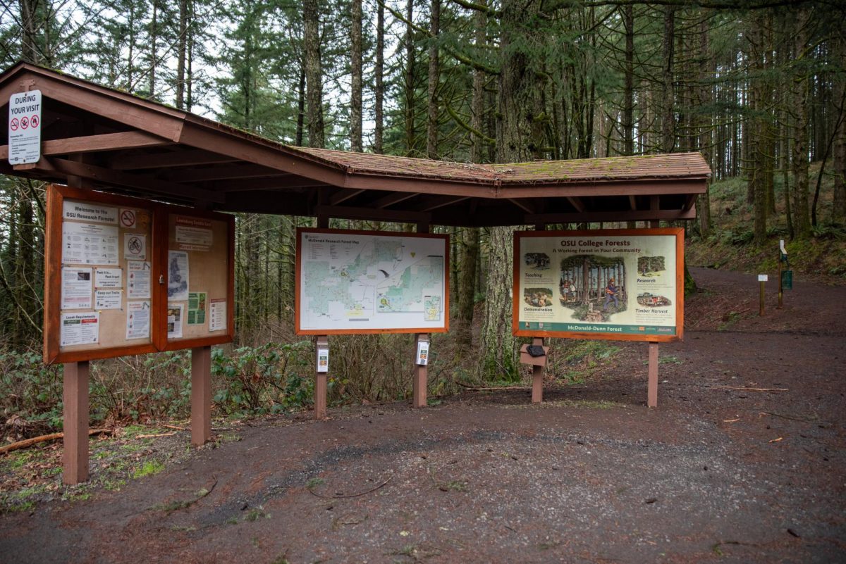 Trail signs and maps guide visitors through the McDonald-Dunn Research Forest near Corvallis on Jan. 9. This forest serves as a critical resource for the Oregon State University College of Forestry, where a new management plan established goals for research and conservation.
