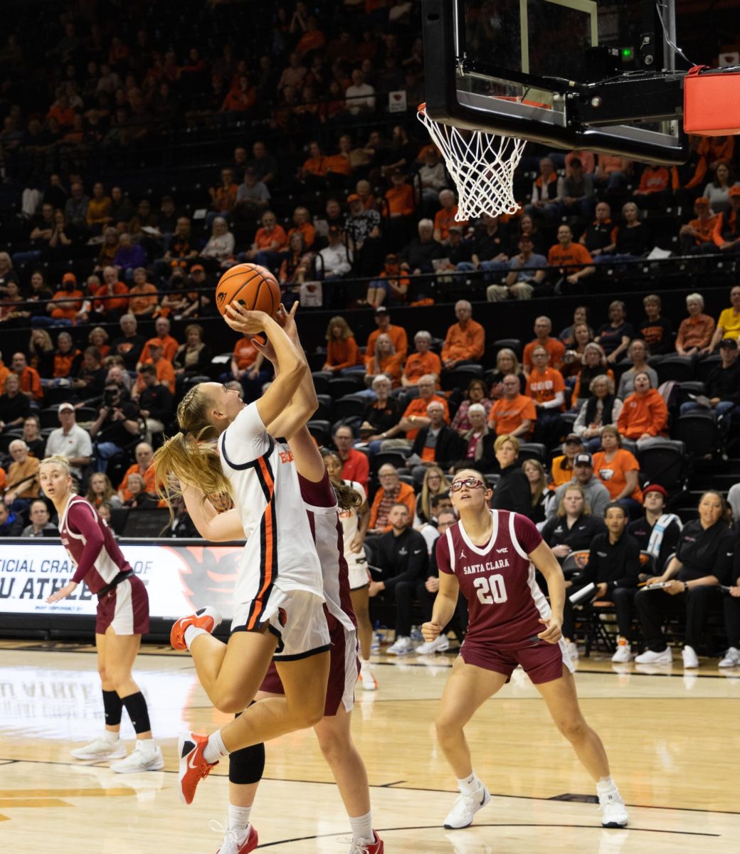 Oregon State point guard Kennedie Shuler (1) maintains possession of the ball during OSU’s Feb. 12 game against Santa Clara University in Gill Coliseum. Shuler secured nine assists and was the second-highest scoring OSU player of the night, yet the Beavers lost 83-70.