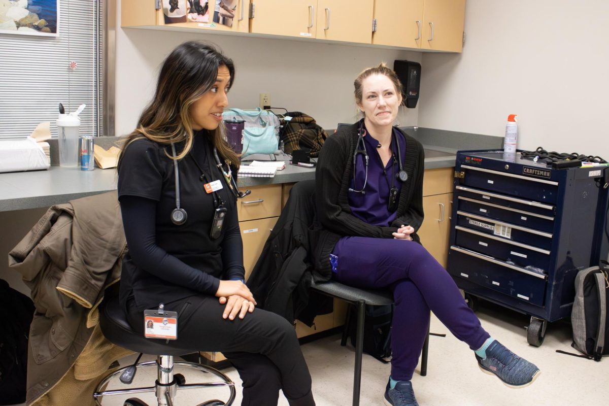 4th year vet students Magali Lewis and Nacome Deese in Oregon State University's
Small Animal Emergency and Critical Care staff room on Feb. 17. OSU’s Lois Bates Acheson Veterinary Teaching Hospital offers emergency pet services that allows
it’s vet students to get hands-on experience.